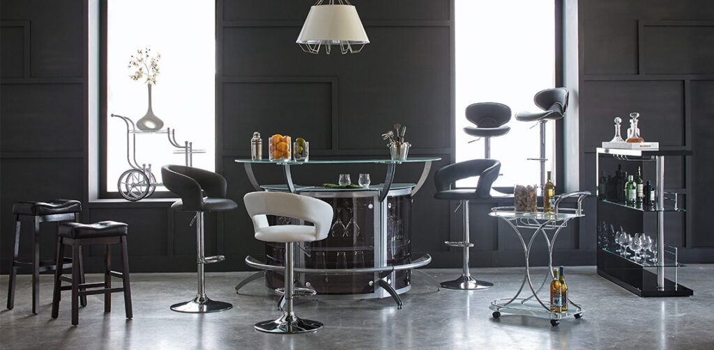 Modern dining area with sleek black and white chairs around a glass table.